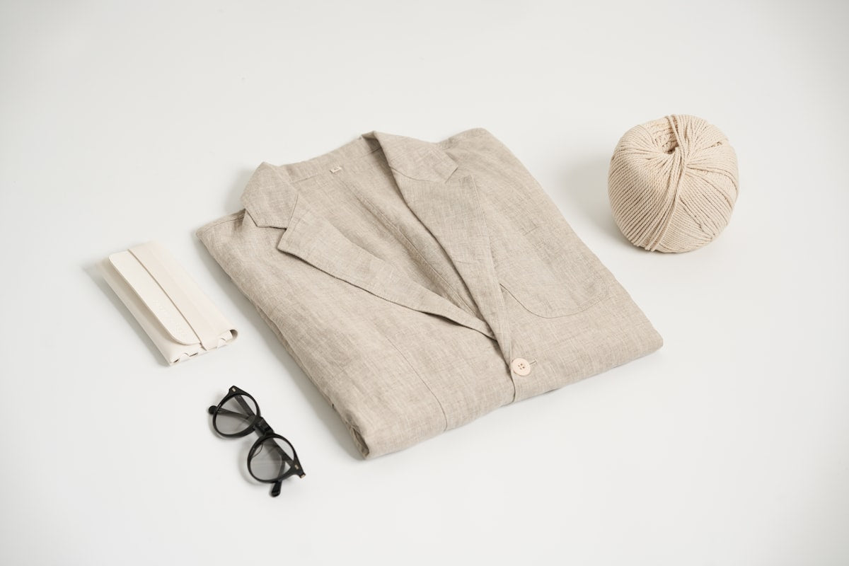 The Overcast Jacket product photo, beige linen jacket folded