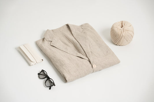 The Overcast Jacket product photo, beige linen jacket folded